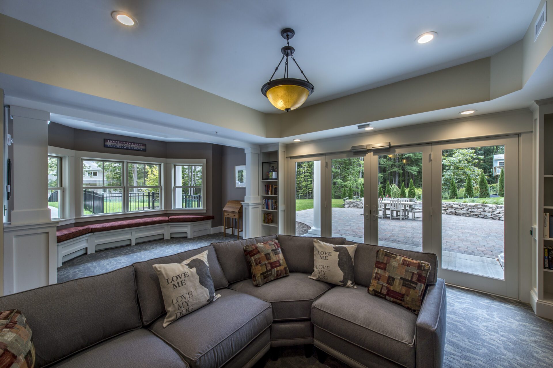 A grey sofa with beautiful pillows