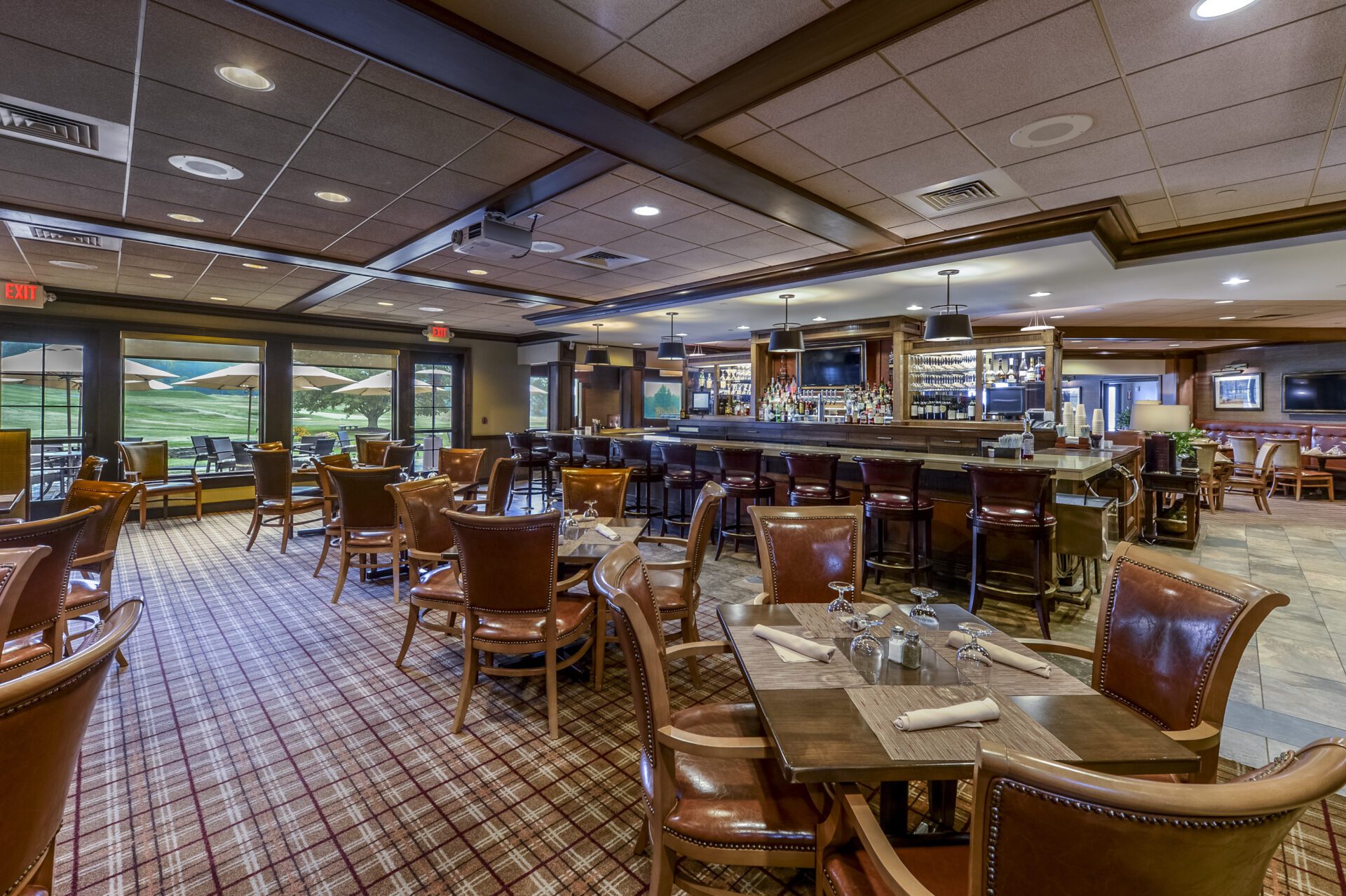 A restaurant with classic brown look along with bar facilities