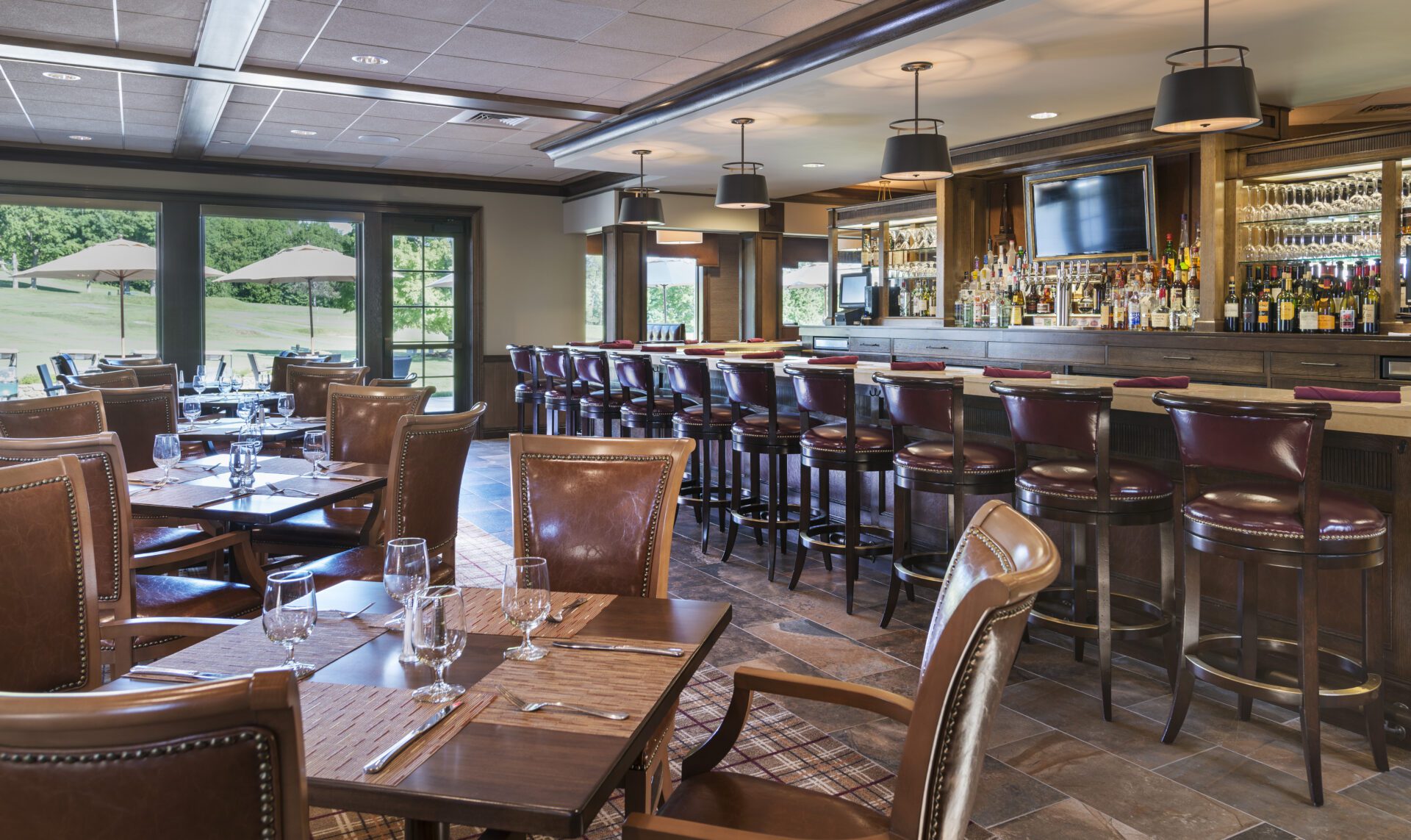 A restaurant with classic brown look along with bar facilities